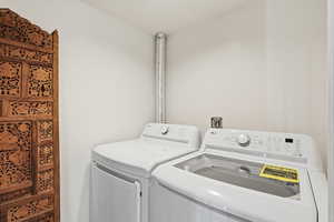 Laundry area featuring washing machine and dryer