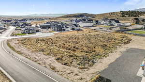 View of mountain background featuring nearby suburban area