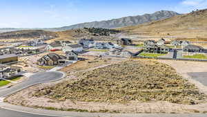 Aerial view of residential area with a mountain backdrop
