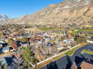 View of mountain background featuring nearby suburban area