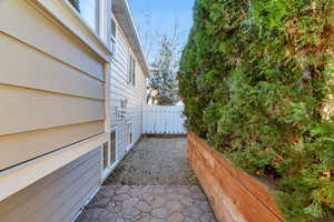 View of side of property featuring a patio area