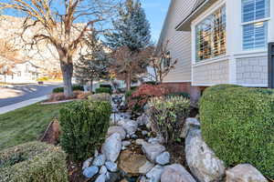 View of yard featuring a small pond