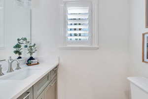 Bathroom with vanity and toilet