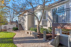 View of property exterior featuring stairs