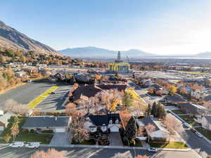 Aerial perspective of suburban area with a mountain backdrop