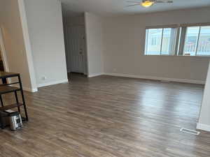 The great room and kitchen area feature Luxury Vinyl Plank (LVP) flooring.