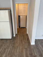 Hallway into the utility space and back door.
