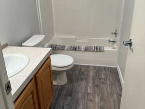 This full bathroom with a vanity, LVP flooring (consistent with the rest of the home), and a shower/bath combo is conveniently located between the two bedrooms.