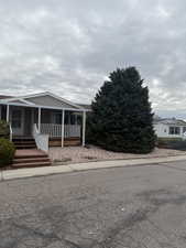 View of front facade featuring covered porch