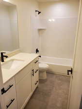 Full bathroom featuring vanity and bathtub / shower combination