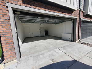 Garage with concrete driveway