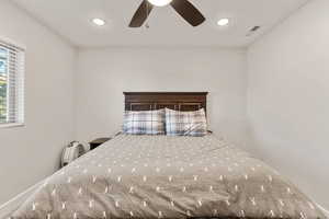 Bedroom featuring recessed lighting and a ceiling fan
