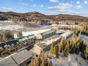 Snowy aerial view with a mountain view