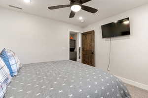 Unfurnished bedroom with ceiling fan, recessed lighting, and carpet flooring
