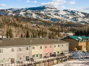 Snowy aerial view with a mountain view