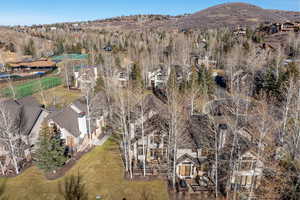 Aerial view of residential area featuring a mountain backdrop