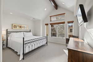 Bedroom featuring light colored carpet, beam ceiling, recessed lighting, and high vaulted ceiling