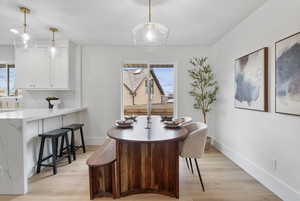 Dining room with light wood-type flooring