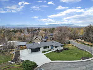 Aerial view of residential area with mountains