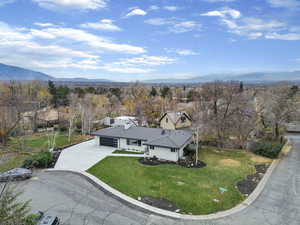 View of subject property featuring a mountain backdrop
