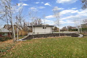 View of side of home with brick siding