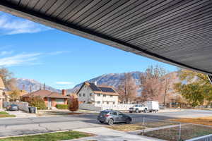 View of yard with a mountain view and a residential view