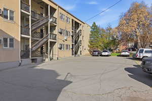 View of apartment building / complex featuring stairway