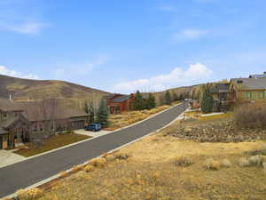 View of asphalt road featuring a mountain view