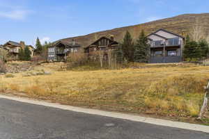 View of front facade with a balcony and a mountain view