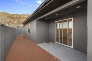 Fenced backyard featuring a patio area