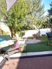 Exterior space featuring a patio area and an outdoor living space