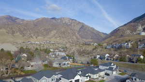 View of mountain background featuring nearby suburban area