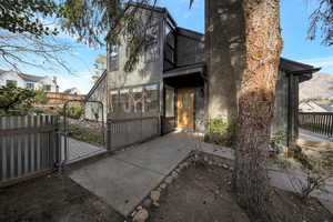 View of front of house featuring a gate