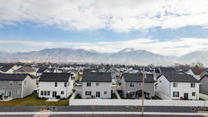 View of mountain background featuring nearby suburban area