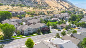 Aerial view of residential area featuring mountains