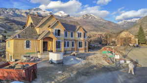 Property under construction with a mountain view