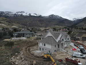 View of mountain background featuring nearby suburban area