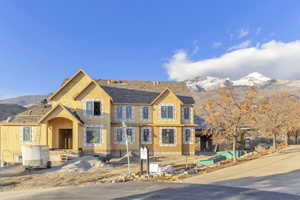 Unfinished property featuring a mountain view