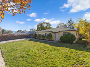 Single story home with stucco siding
