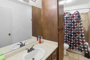 Bathroom with vanity and toilet