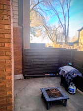 Patio / terrace featuring a fire pit and area for grilling