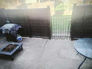 Gate featuring a fire pit