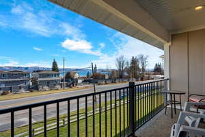 Balcony with a residential view and a mountain view