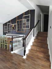 Staircase with wood finished floors