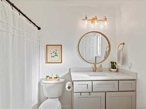 Bathroom featuring vanity and a shower with curtain