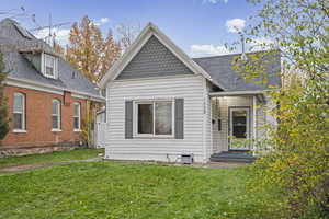 View of front of house with a front yard