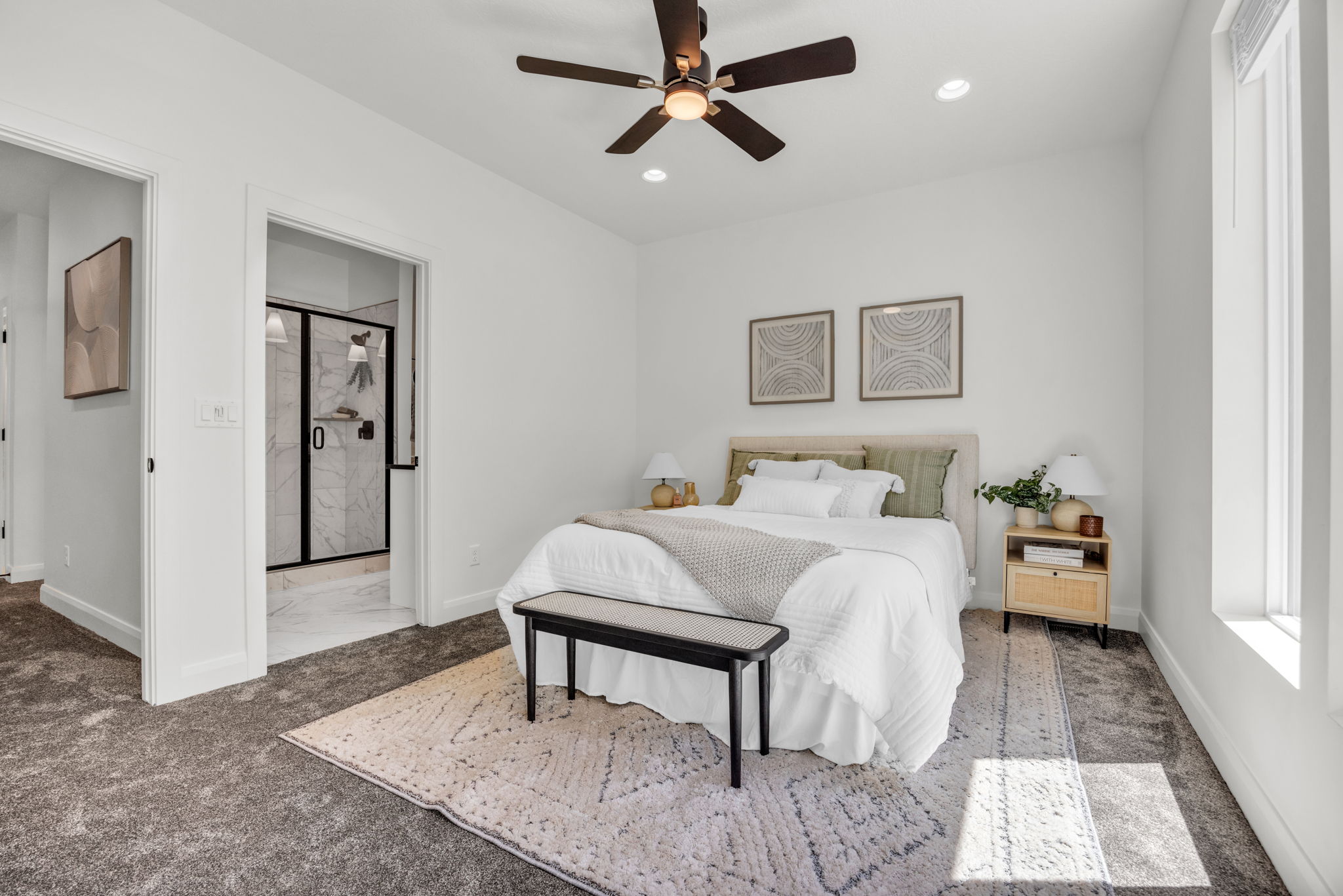 Carpeted bedroom featuring a ceiling fan and recessed lighting