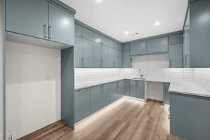 Entertain effortlessly in this stylish basement kitchen.