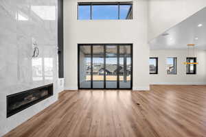 Imagine stepping into your new home, where the family room seamlessly flows into the extended outdoor living space, creating the perfect blend of comfort and open-air relaxation.