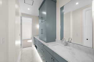 Large Jack & Jill bathroom entrance from one of the bedrooms in the basement.